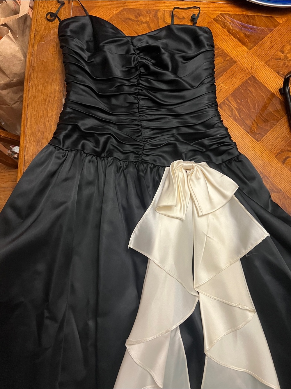 Black Satin Prom Dress with Ivory Bow Accent